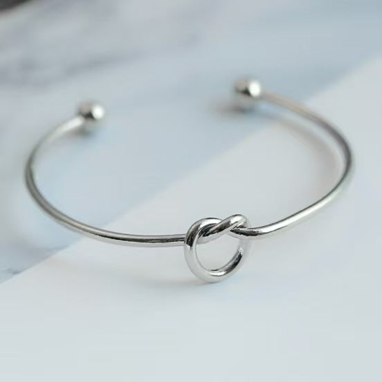 Bracelet jonc plaqué or 14 carats avec nœud d'amour éternel et infini